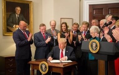 President Donald Trumps signs an executive order to reform health care plans