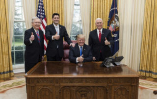 President Trump celebrates the tax cut bill