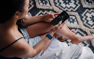 A woman looking at her phone