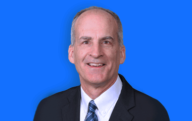 A headshot of Dr. Eric J. Olson, MD, president of the American Academy of Sleep Medicine board of directors.